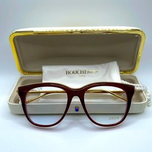NWOT. Boucheron Optical lenses. Plum and gold. Plum frames with gold accents.